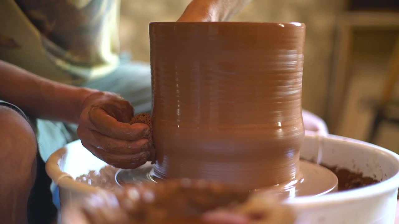 Download Stock Video A Ceramic Artist Making A Vase Live Wallpaper for PC