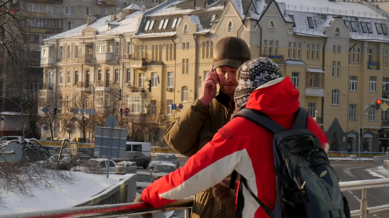 Download Stock Video A Couple Of Men Talking On The Street Live Wallpaper for PC