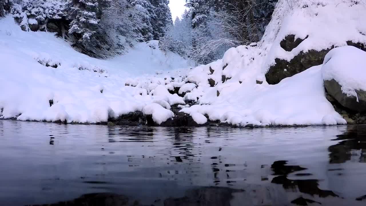 Download Stock Video A Dive Into The Snowy Mountain Lake Live Wallpaper for PC