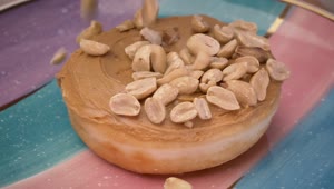 Download Stock Video Adding Peanuts To A Peanut Butter Donut Live Wallpaper for PC