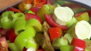 Download Stock Video Adding Sliced Vegetables To A Dish Live Wallpaper for PC