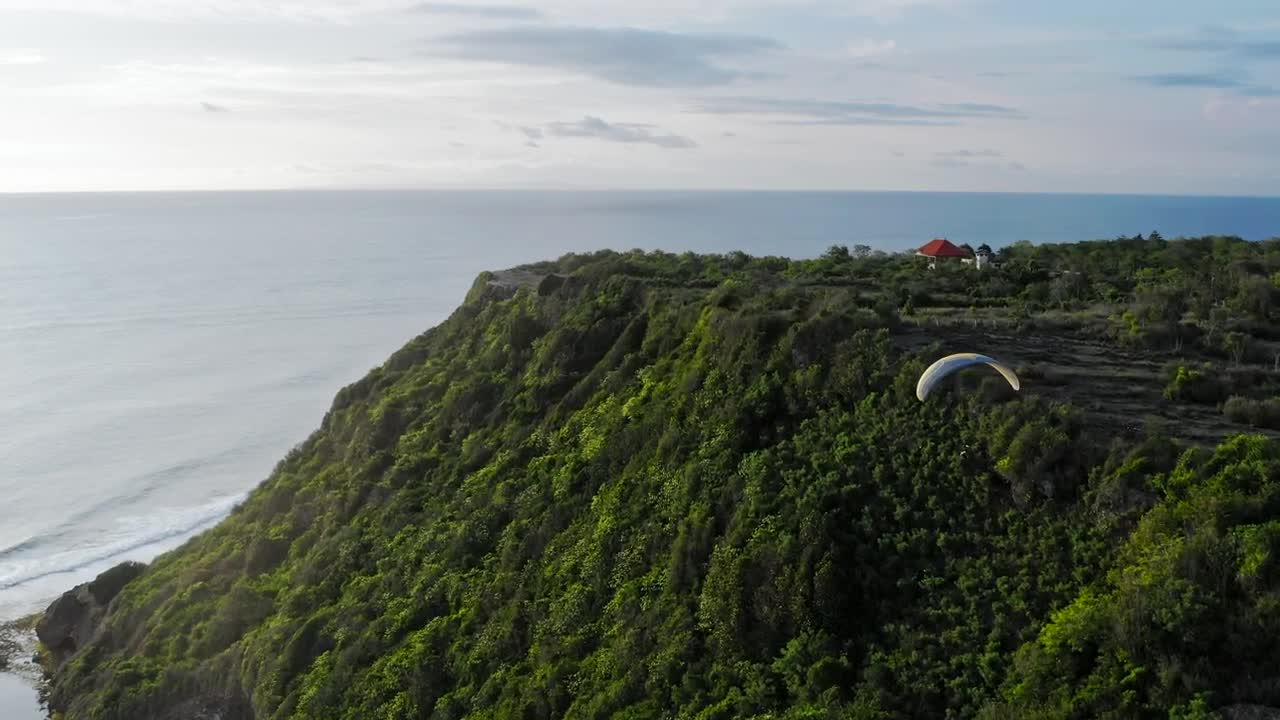 Download Stock Video Aerial Shot Of A Person Practicing Parachuting Live Wallpaper for PC