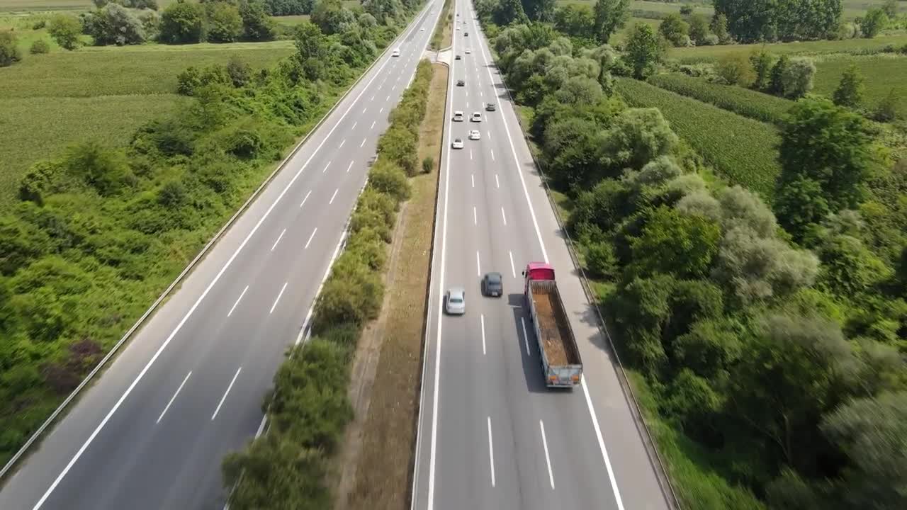 Download Stock Video Aerial Tacking Shot Of The Highway Traffic Live Wallpaper for PC