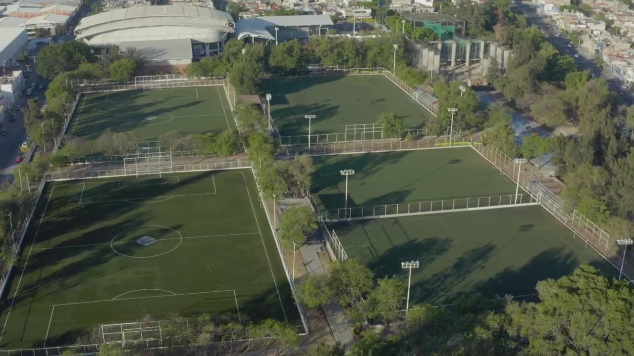 Download Stock Video Aerial View Over A Field With Soccer Courts Live Wallpaper for PC