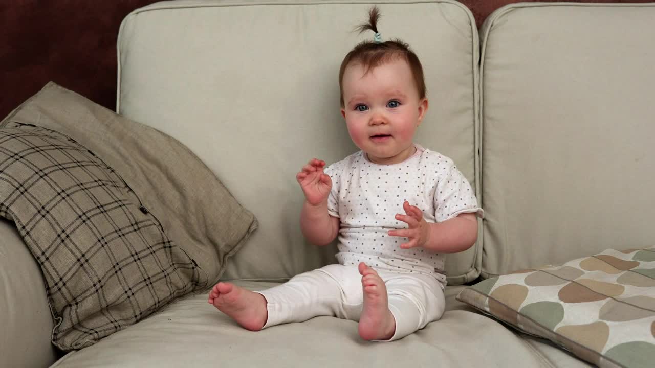 Download Stock Video Baby Smiling On The Sofa Live Wallpaper For PC