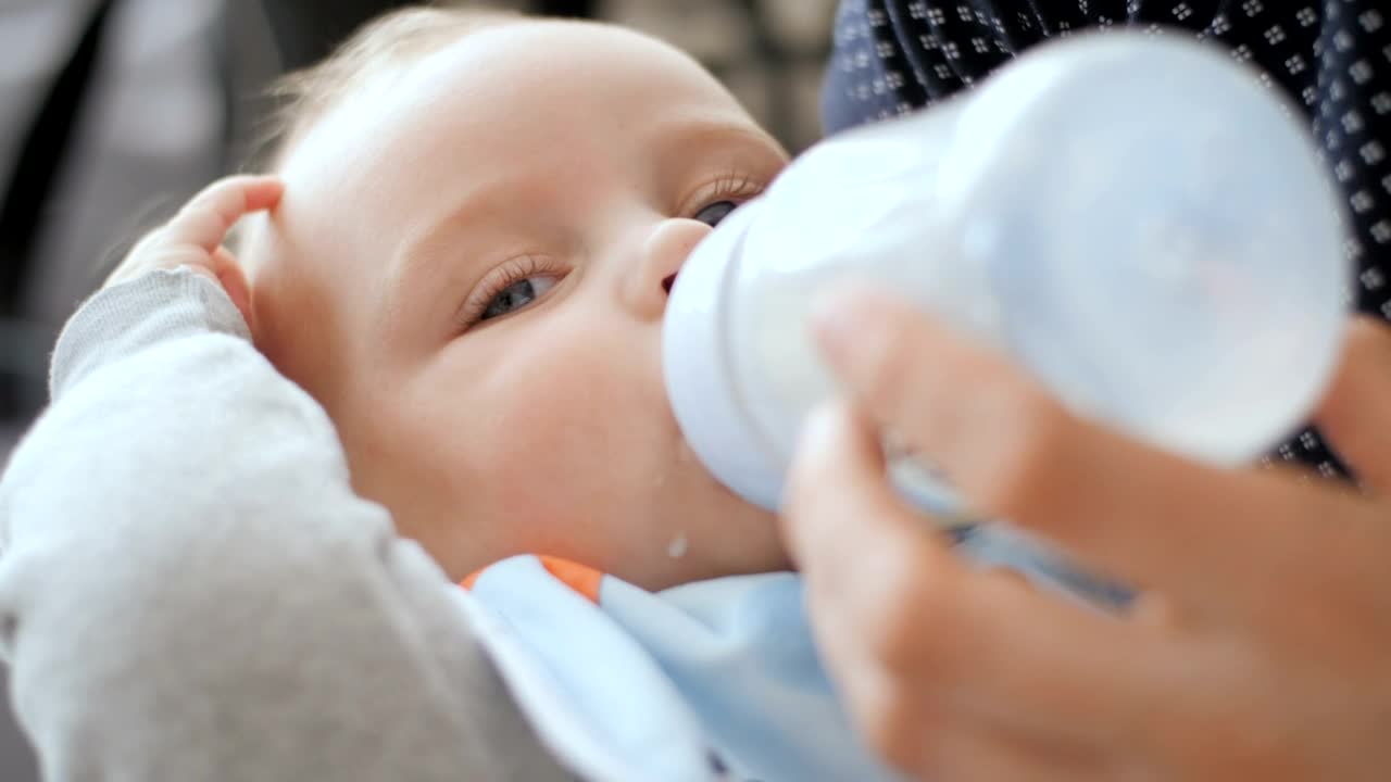 Download Stock Video Baby Drinking Form The Milk Bottle Live Wallpaper For PC