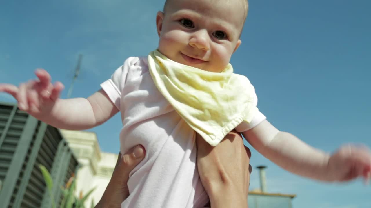 Download Stock Video Baby Being Held In The Air Live Wallpaper For PC