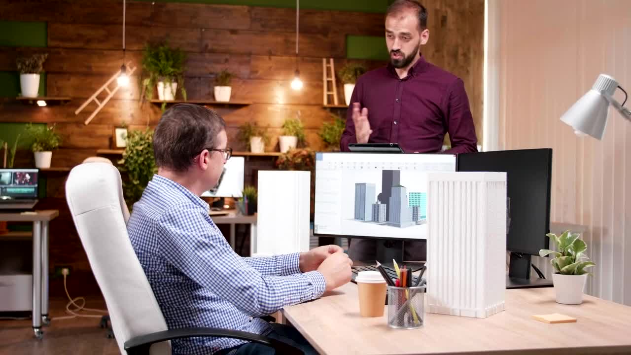 Download Stock Video Architects Discussing Building Designs Live Wallpaper For PC