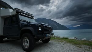 Download Stock Video An Off Road Camper Van By The Lake Live Wallpaper For PC