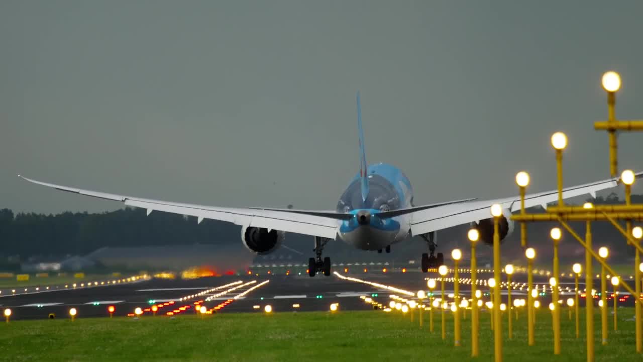 Download Stock Video Airplane Landing In Illuminated Airport Tracks Live Wallpaper For PC