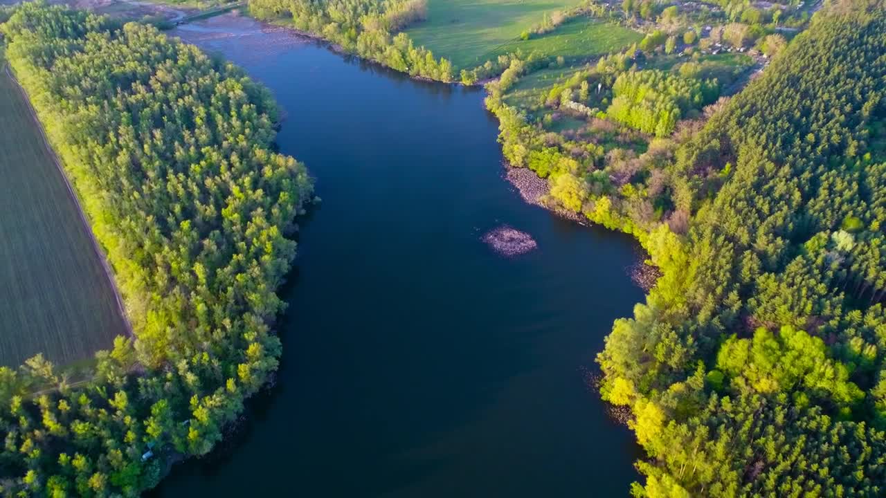 Download Stock Video Agriculture Field And Trees Between A River Live Wallpaper For PC