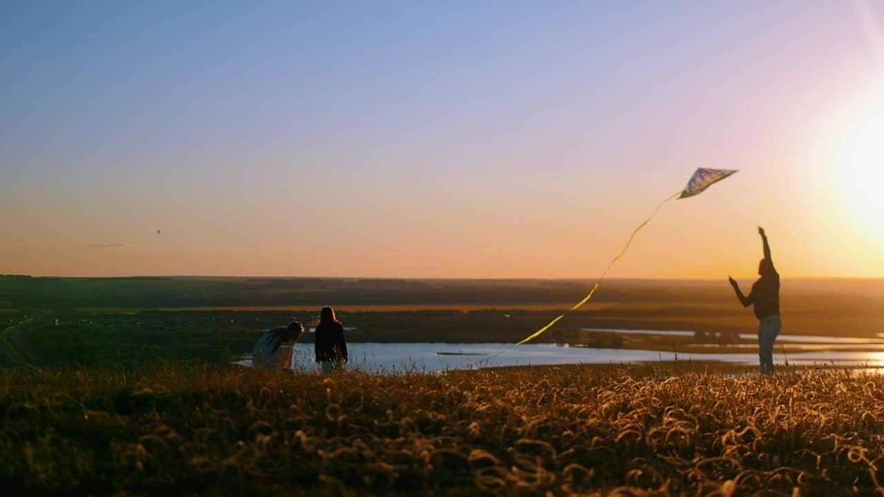 Download Stock Video A Young Family Enjoying The Wind At The Valley Live Wallpaper For PC