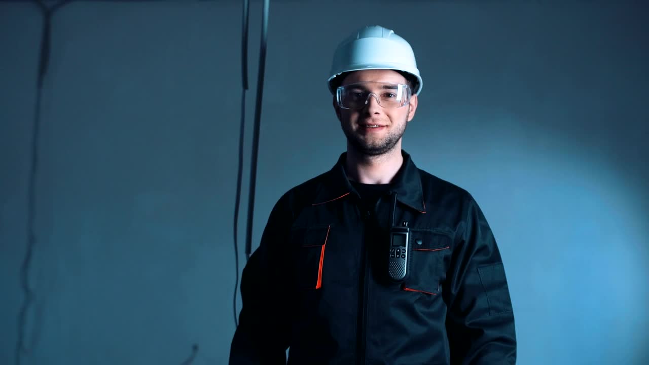 Download Stock Video A Young Construction Worker Posing For The Camera Live Wallpaper For PC