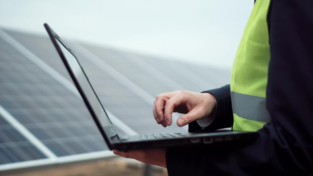 Download Stock Video A Worker With A Laptop Or On A Solar Panel Live Wallpaper For PC