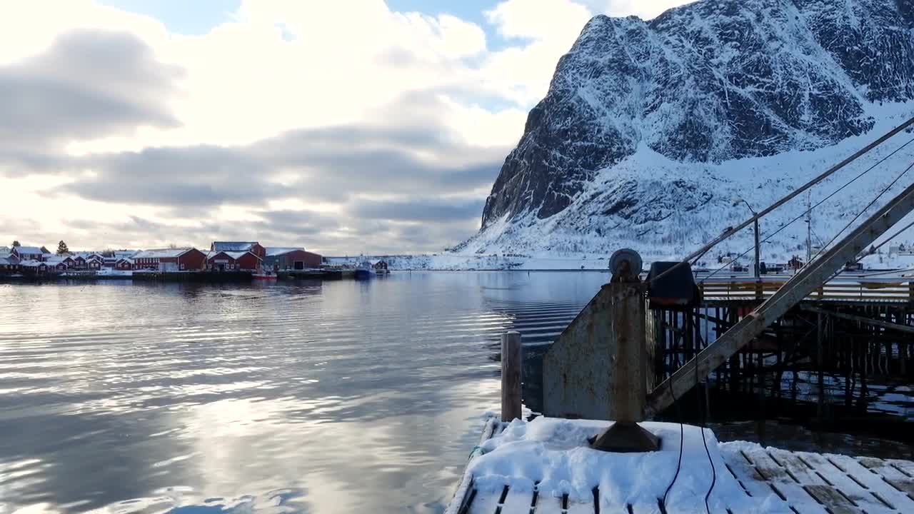 Download Stock Video A Woman Taking A Photo Of A Snowy Mountain Live Wallpaper For PC