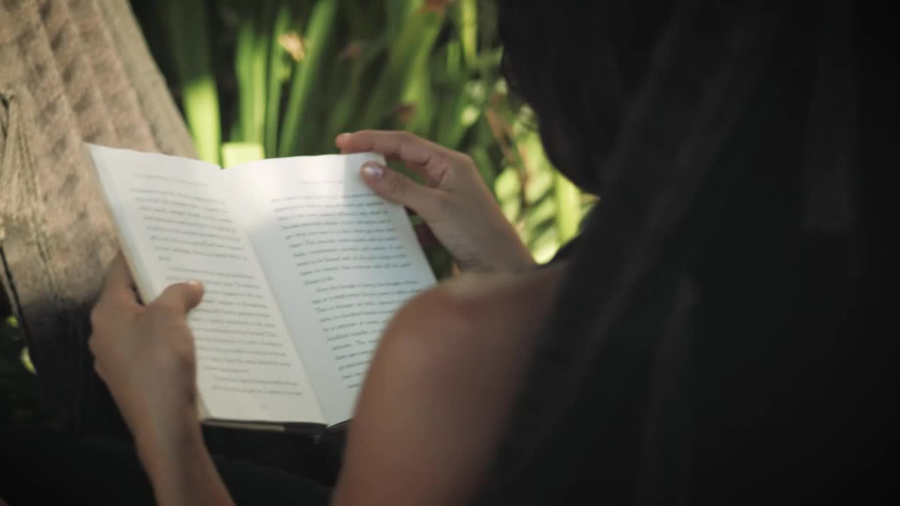 Download Stock Video A Woman Reading On A Hammock Among Plants Live Wallpaper For PC