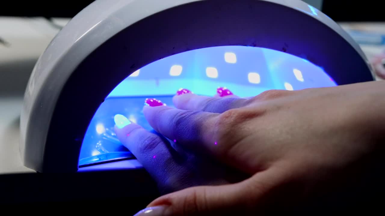 Download Stock Video A Woman Hand In A Uv Lamp Live Wallpaper For PC