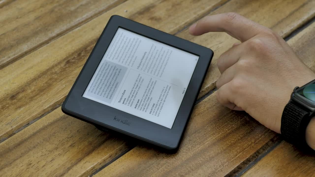 Download Stock Video A Person Reading An Ebook On A Tablet Live Wallpaper For PC