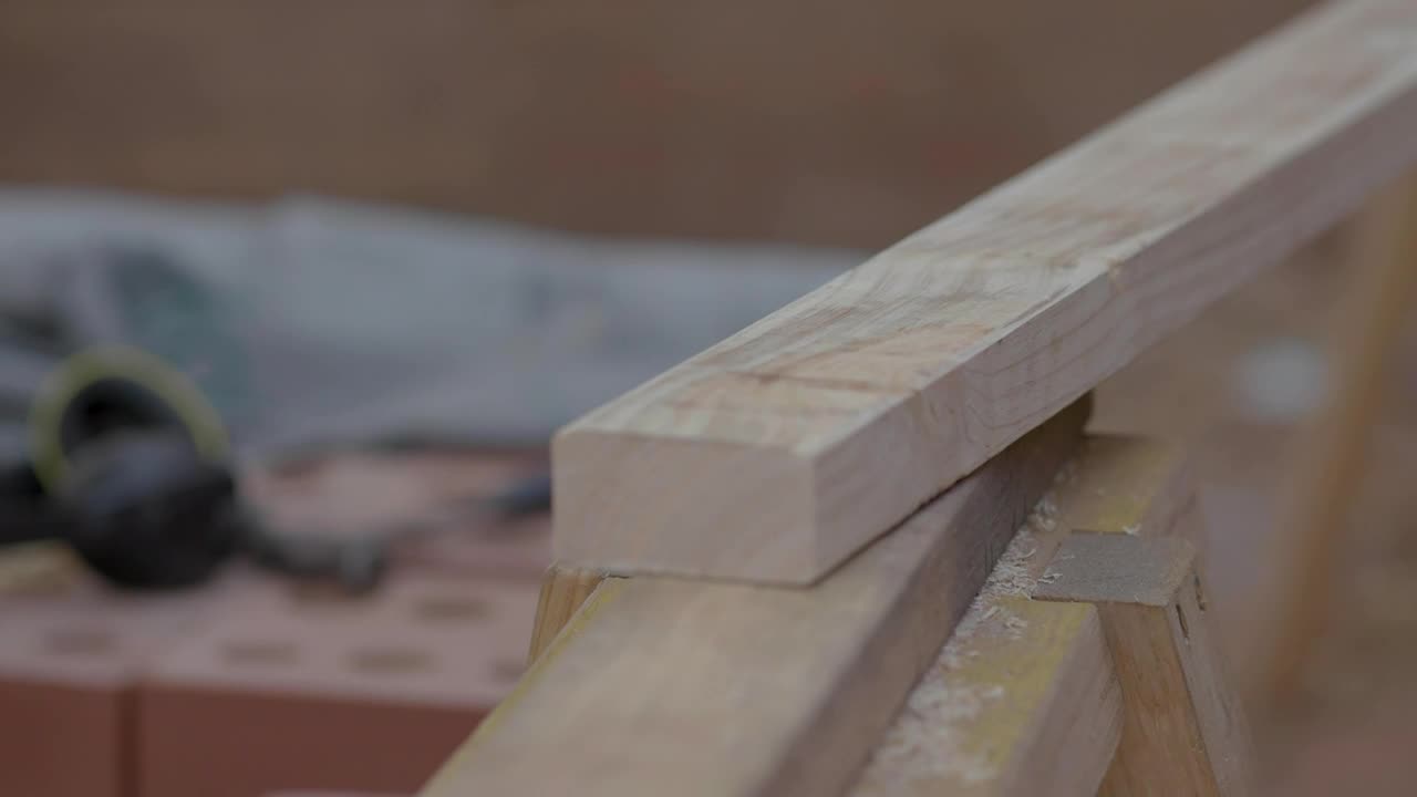 Download Stock Video A Person Measures A Block Of Wood For Construction Live Wallpaper For PC