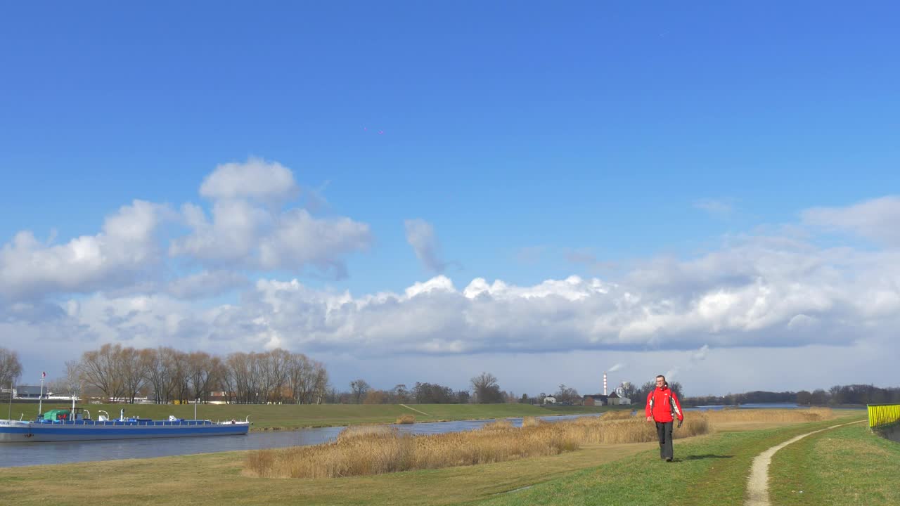 Download Stock Video A Man Walking By The Riverside Live Wallpaper For PC