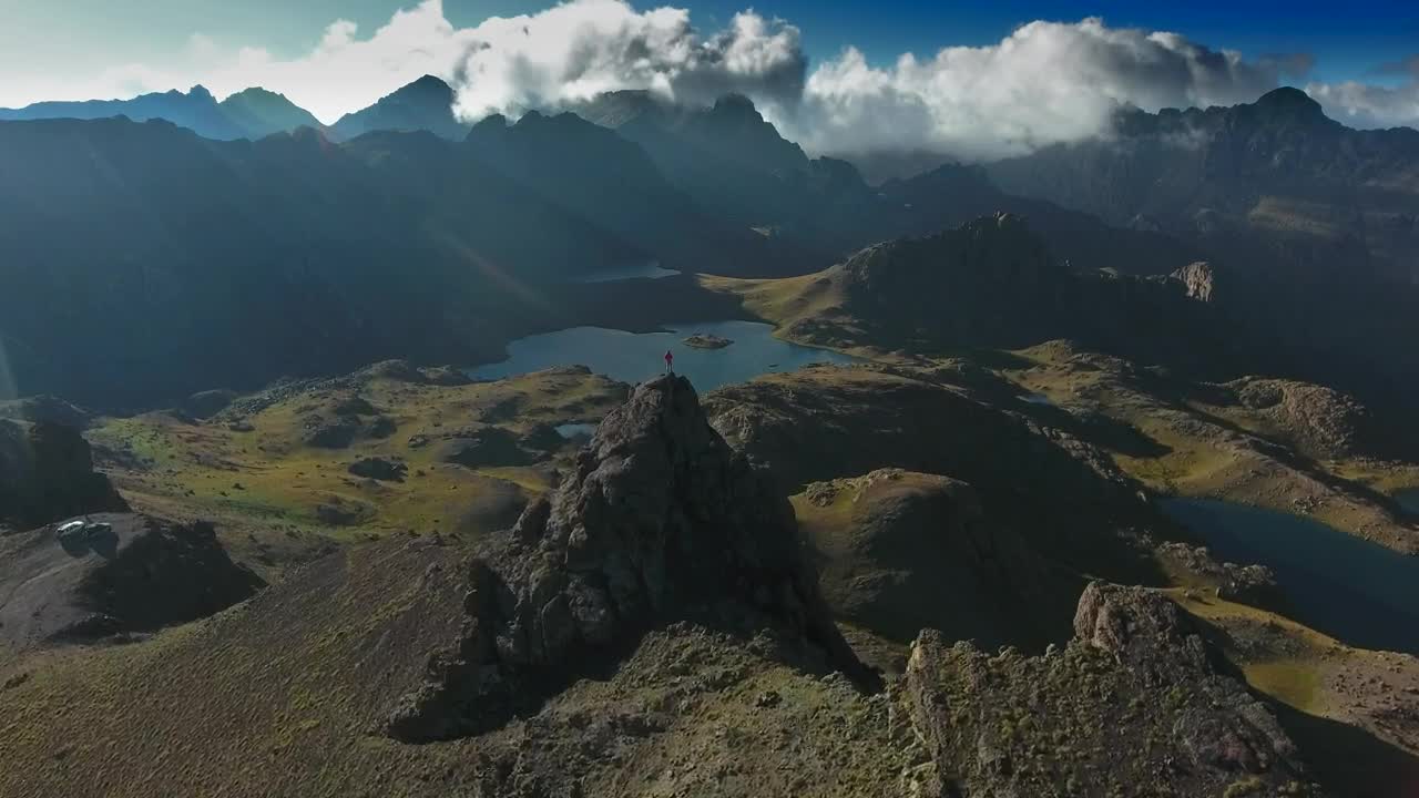 Download Stock Video A Man On Top Of A Mountain Peak Live Wallpaper For PC