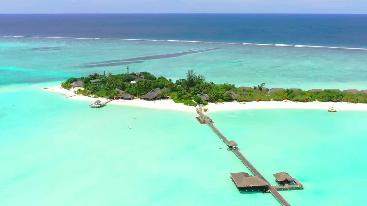 Download Stock Video A Luxury Tourist Island With A Pier And Bungalows Live Wallpaper For PC