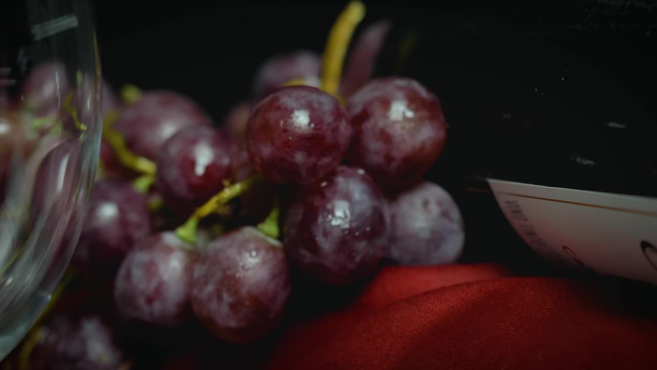 Download Stock Video A Glass A Bunch Of Grapes And A Bottle Of Live Wallpaper For PC