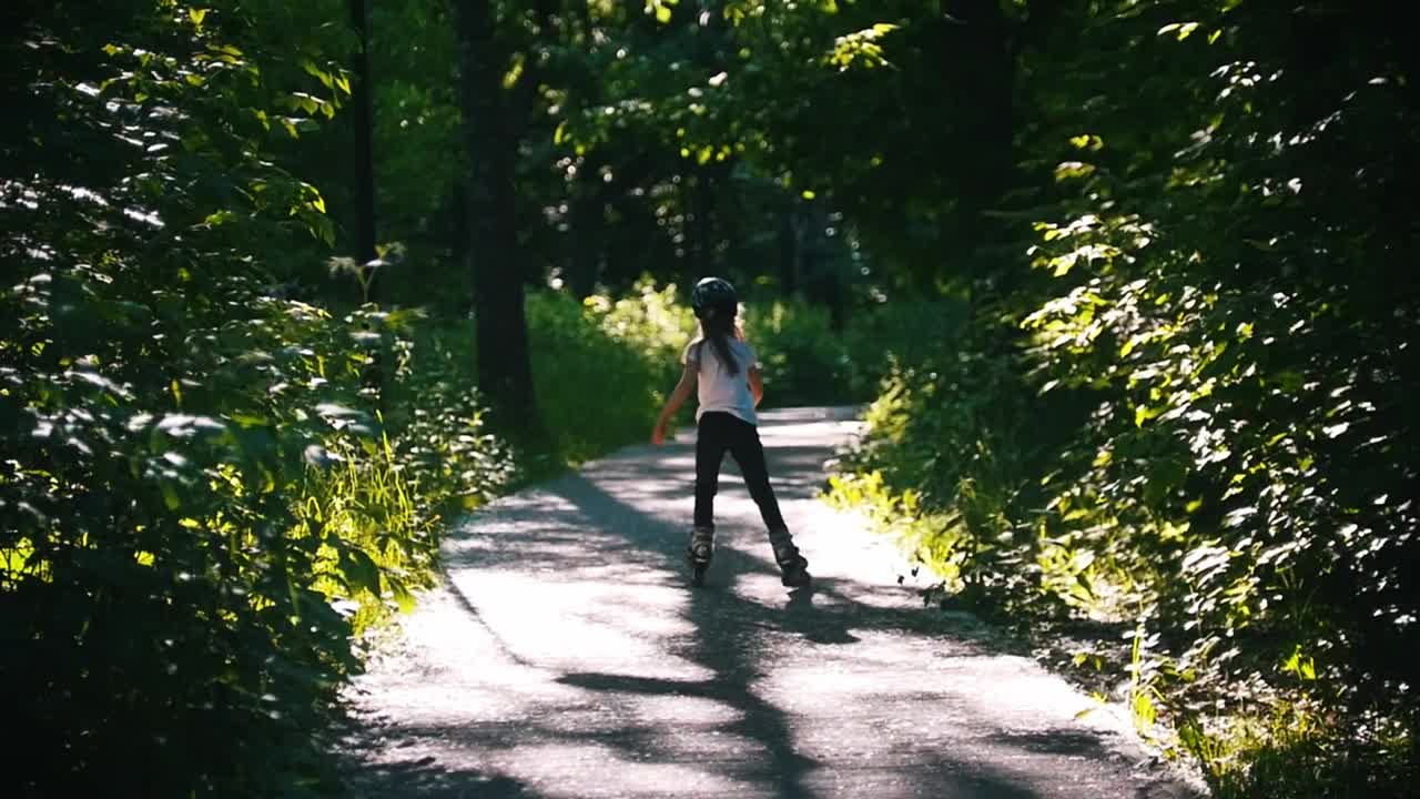 Download Stock Video A Girl Skating On A Park Road Live Wallpaper For PC