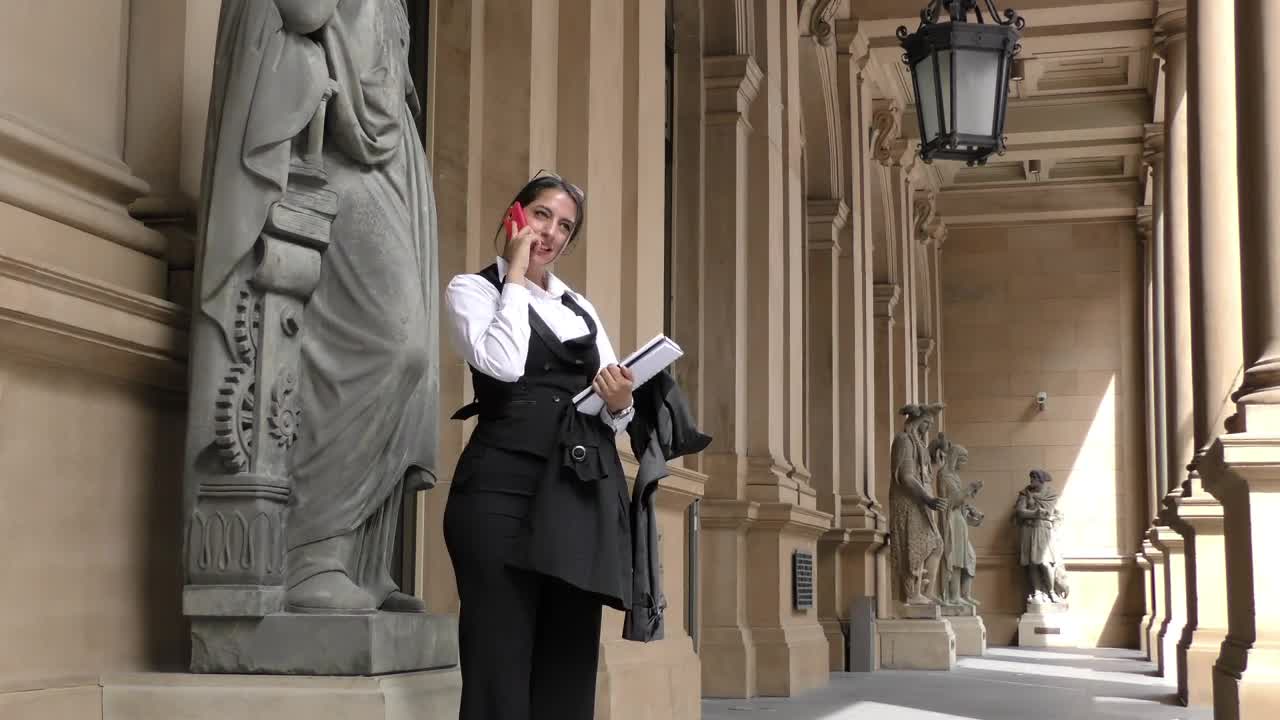 Download Stock Video Business Woman In The Exterior Hallway Of A Classic Building Live Wallpaper For PC