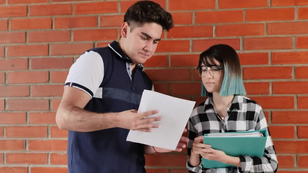 Download Stock Video Boys Man And Woman In A School Reviewing Information Live Wallpaper For PC