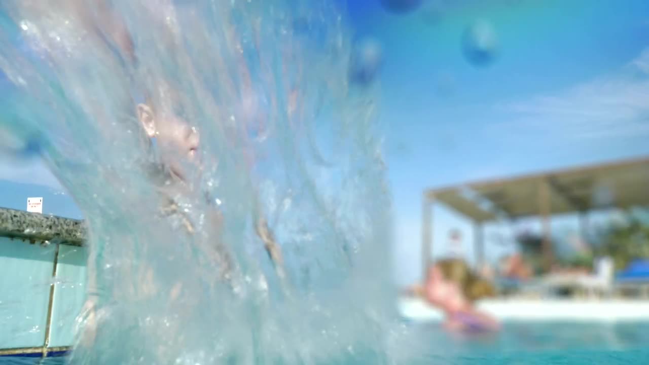 Download Stock Video Boy Splashing The Camera With Pool Water Live Wallpaper For PC