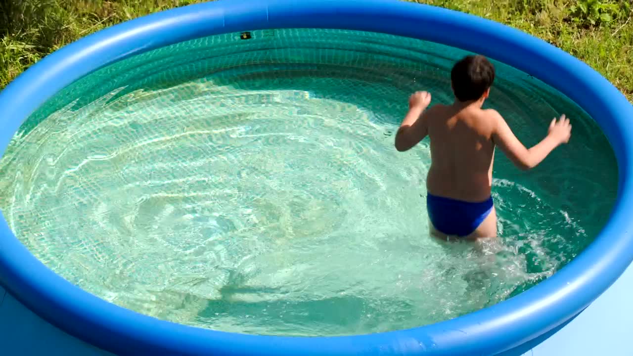 Download Stock Video Boy Splashing In A Small Pool Live Wallpaper For PC