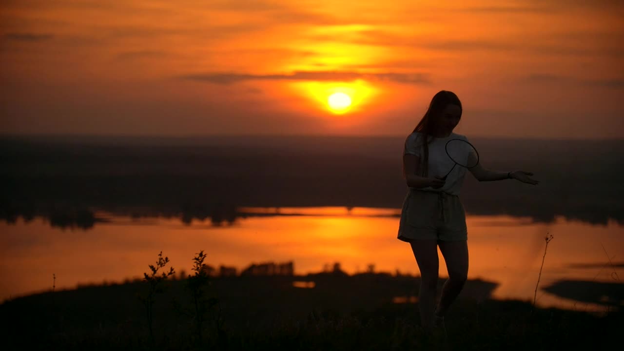 Download Stock Video Boy And Girl Playing Badminton In The Sunset Live Wallpaper For PC