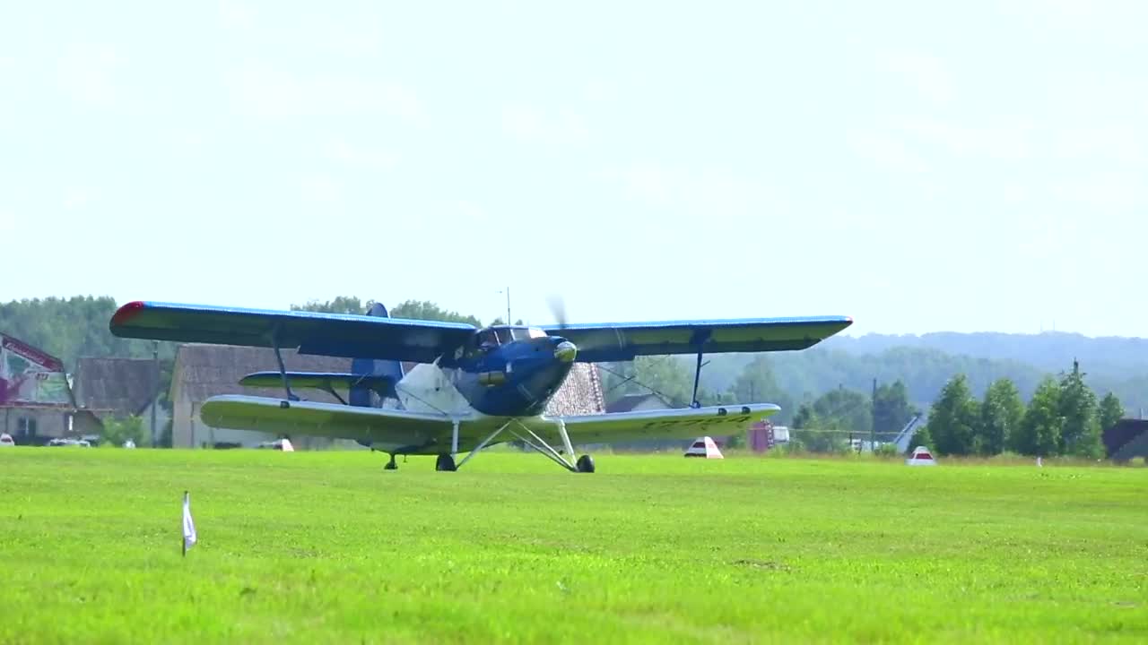 Download Stock Video Biplane Crossing The Grass Field Live Wallpaper For PC