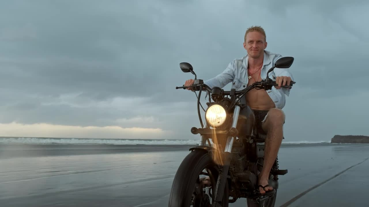 Download Stock Video Biker Riding His Motorcycle On The Beach Live Wallpaper For PC