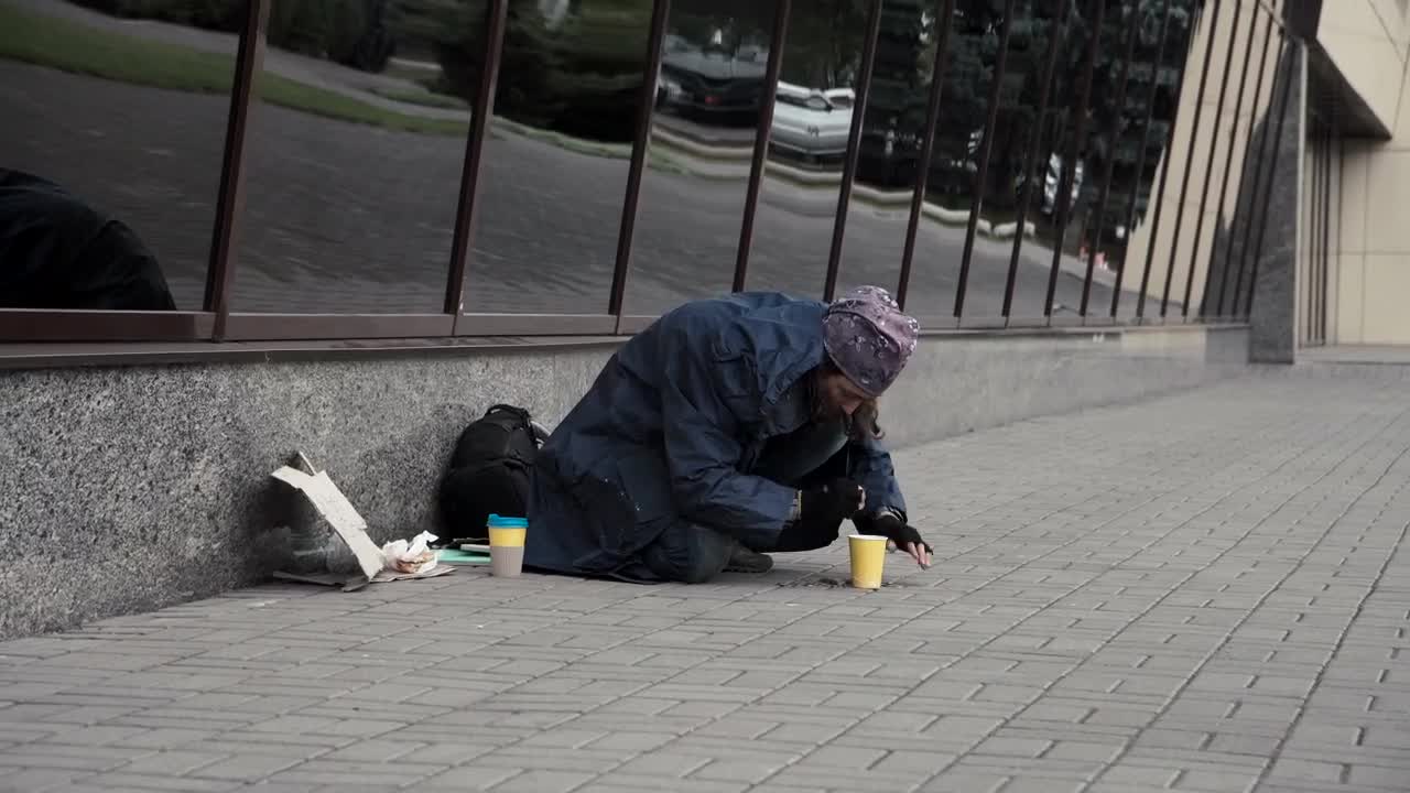 Download Stock Video Beggar Picking Change From The Street Live Wallpaper For PC