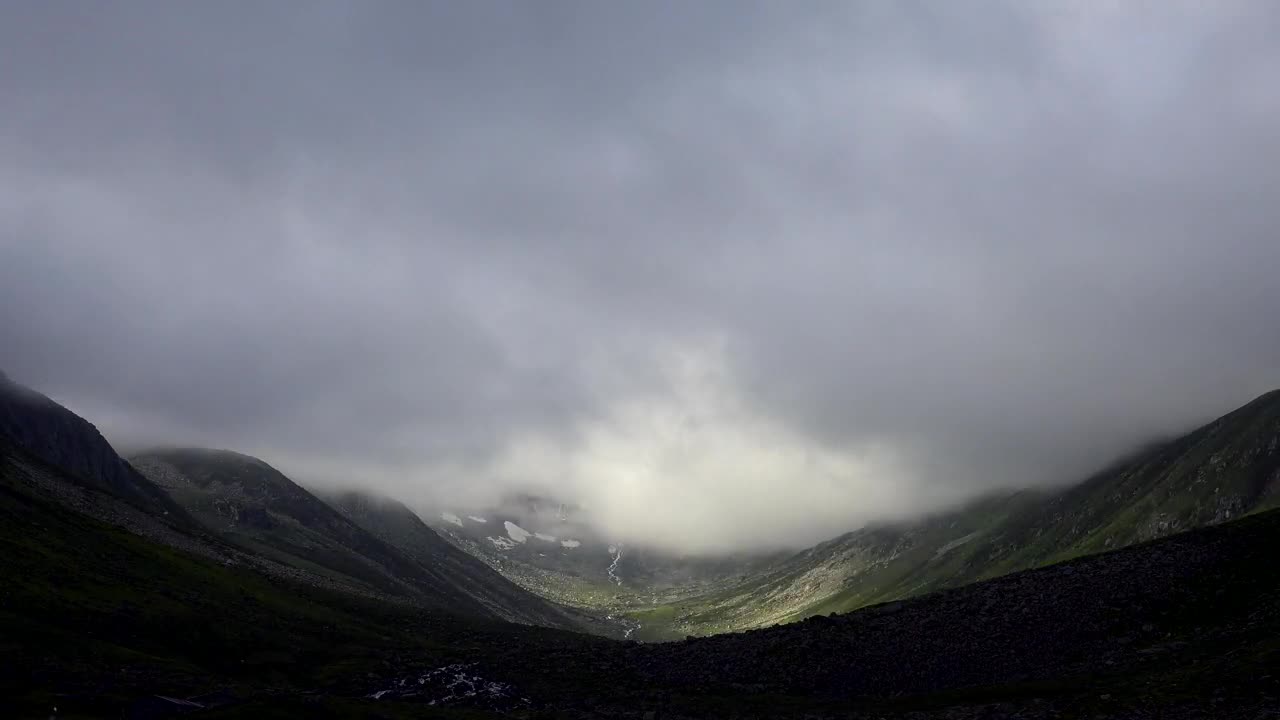 Download Video Stock Clouds And A Sharp Rocky Mountain Live Wallpaper For PC