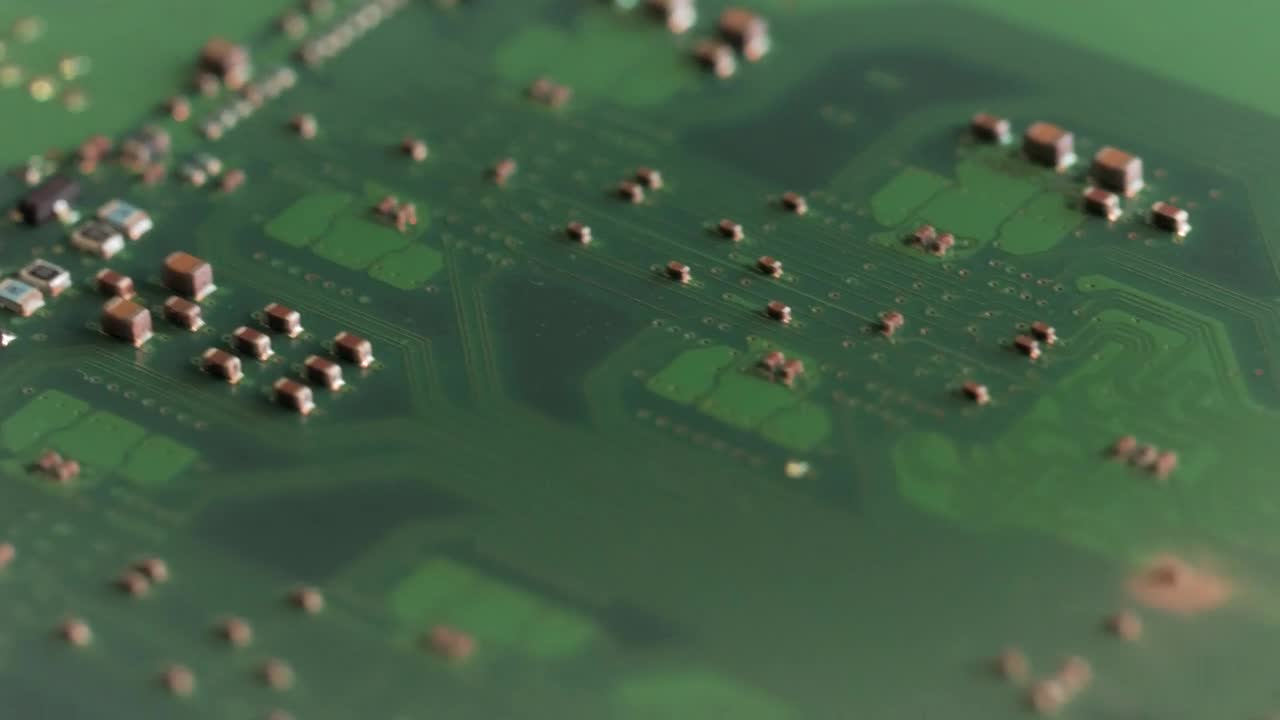 Download Video Stock Closeup Video Of A Motherboard With Microchips Live Wallpaper For PC