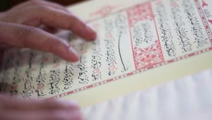 Download Video Stock Close Up Of A Person Reading The Quran Live Wallpaper For PC