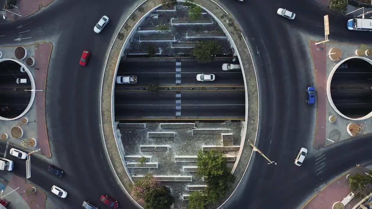 Download Video Stock City Traffic Going Around A Roundabout From Above Live Wallpaper For PC