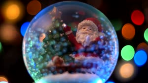 Download Video Stock Christmas Santa Sphere With Bokeh Background Live Wallpaper For PC