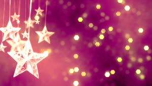 Download Video Stock Christmas Hanging Stars With Pink Bokeh Background Live Wallpaper For PC