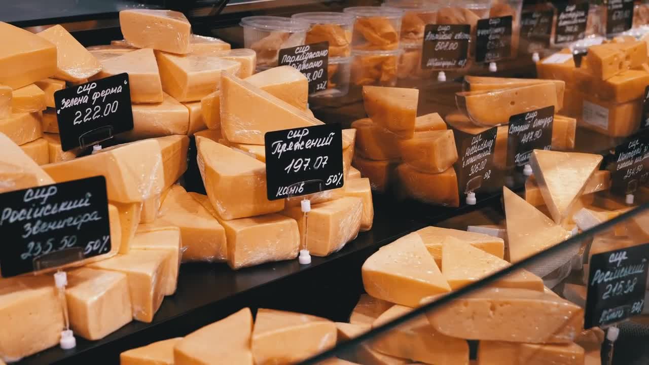 Download Video Stock Chopped Pieces Of Cheese In The Counter Live Wallpaper For PC