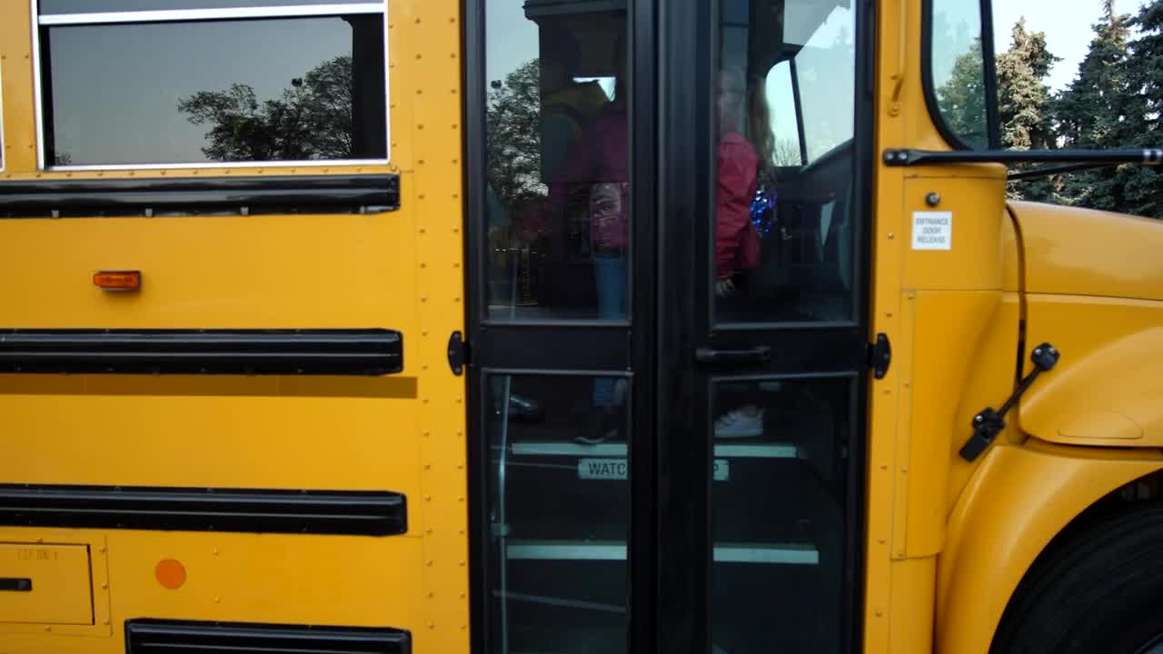 Download Video Stock Children Getting Off A Yellow School Bus Live Wallpaper For PC