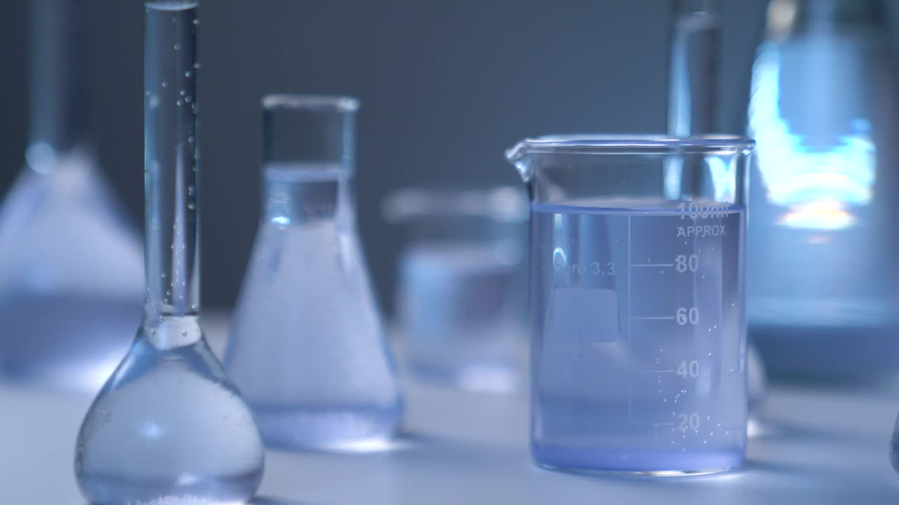 Download Video Stock Chemical Flasks On A Table Live Wallpaper For PC