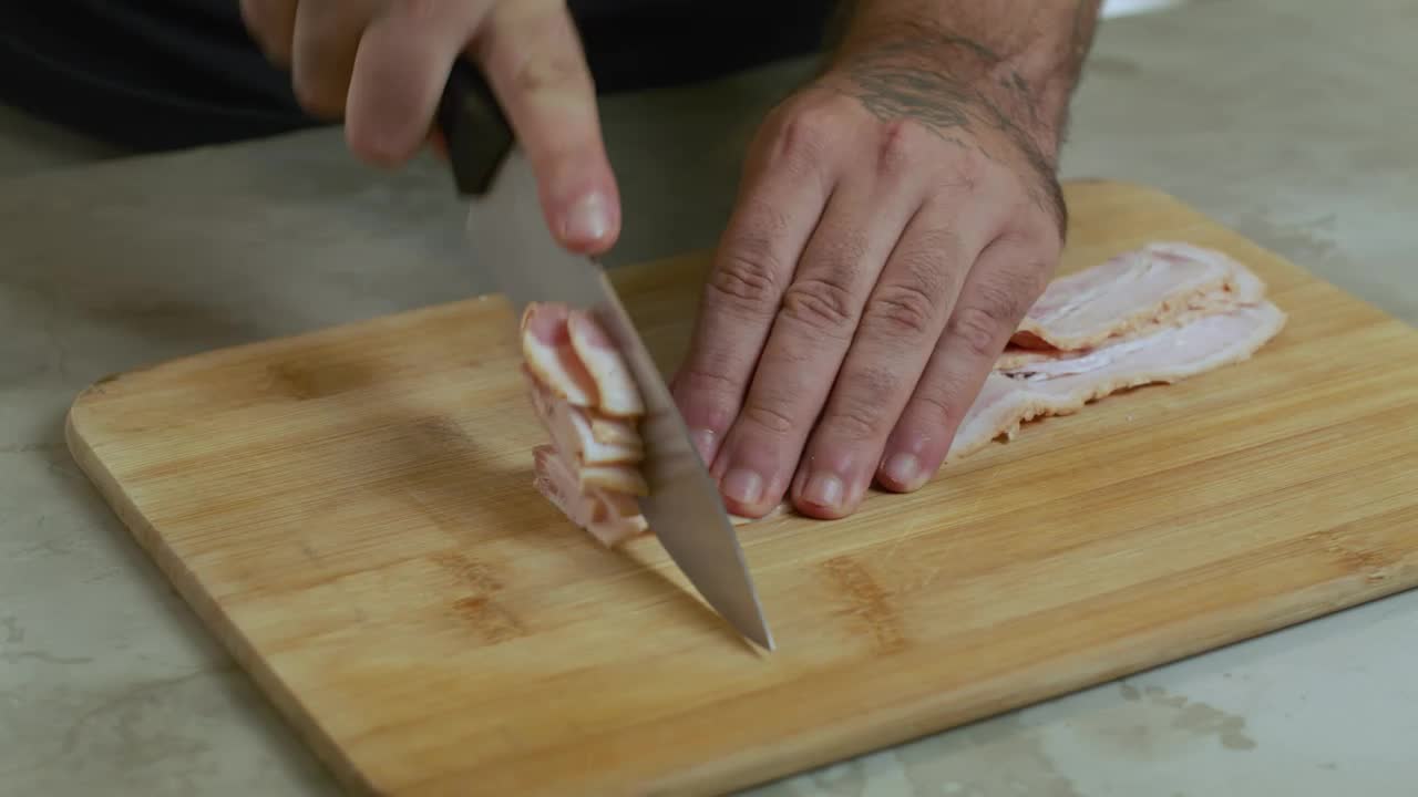 Download Video Stock Chef Chopping Bacon On A Board Live Wallpaper For PC