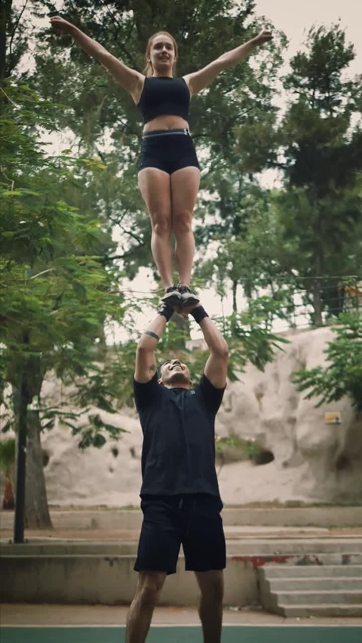 Download Video Stock Cheerleader Boy Catching His Partner After A Pyramid Live Wallpaper For PC