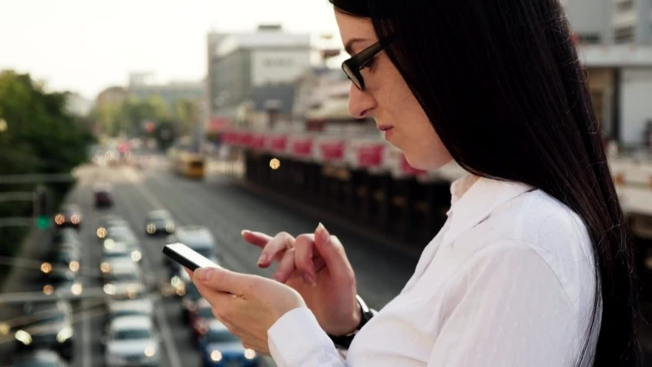 Download Video Stock Checking Her Phone On A Bridge Live Wallpaper For PC