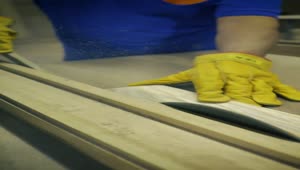 Download Video Stock Carpenter Slicing A Wooden Board In A Close Up Shot Live Wallpaper For PC
