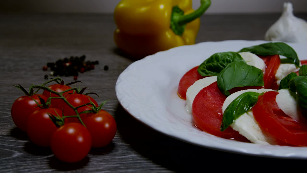 Download Video Stock Caprese Salad With Oil And Garlic Live Wallpaper For PC